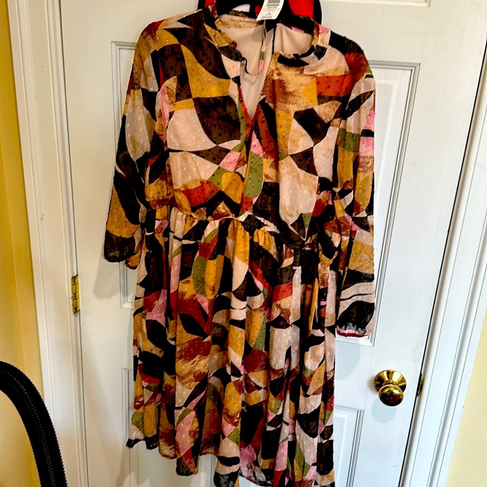Torrid brand-Mini clip.front keyhole dress Geo print
